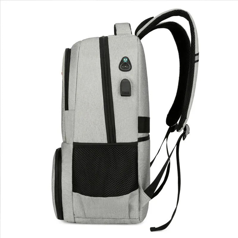Light grey Oxford cloth insulated backpack with curved shoulder straps and front organisation compartments.