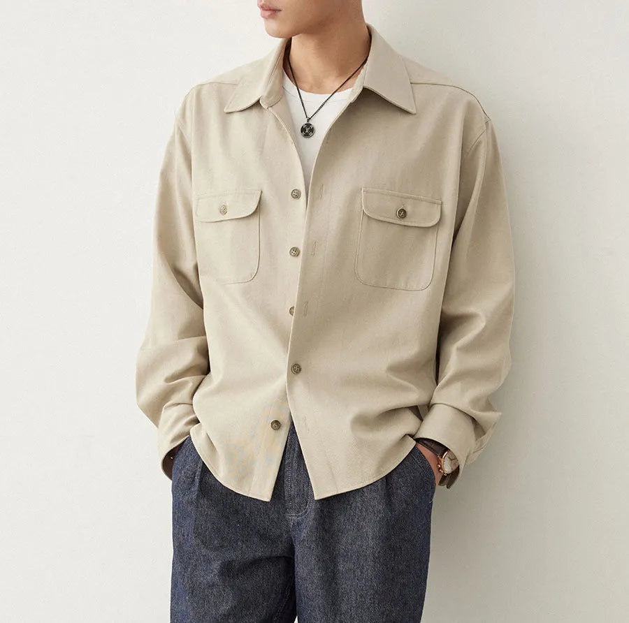 Men's cotton blend lapel shirt in light sand rice colour showing simple collar design and long sleeves