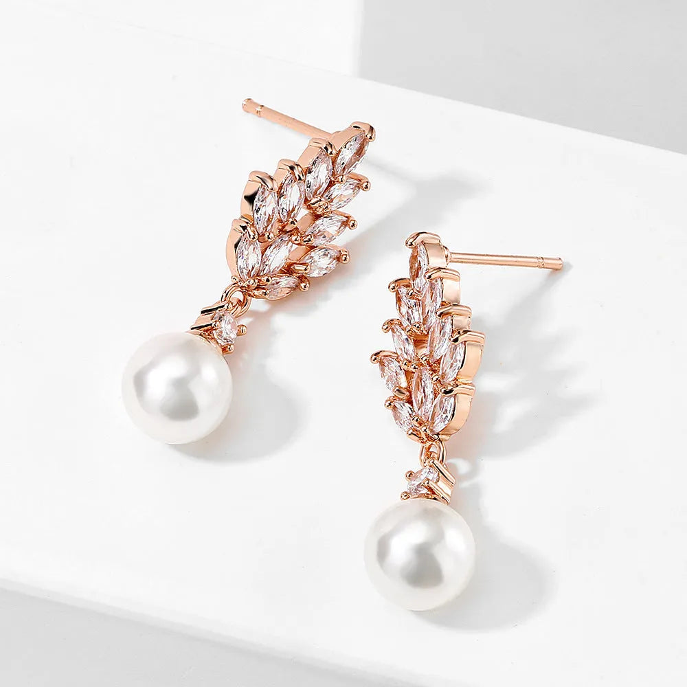 Micro geometric flower earrings with zircon accents in gold, platinum and rose gold plating colours