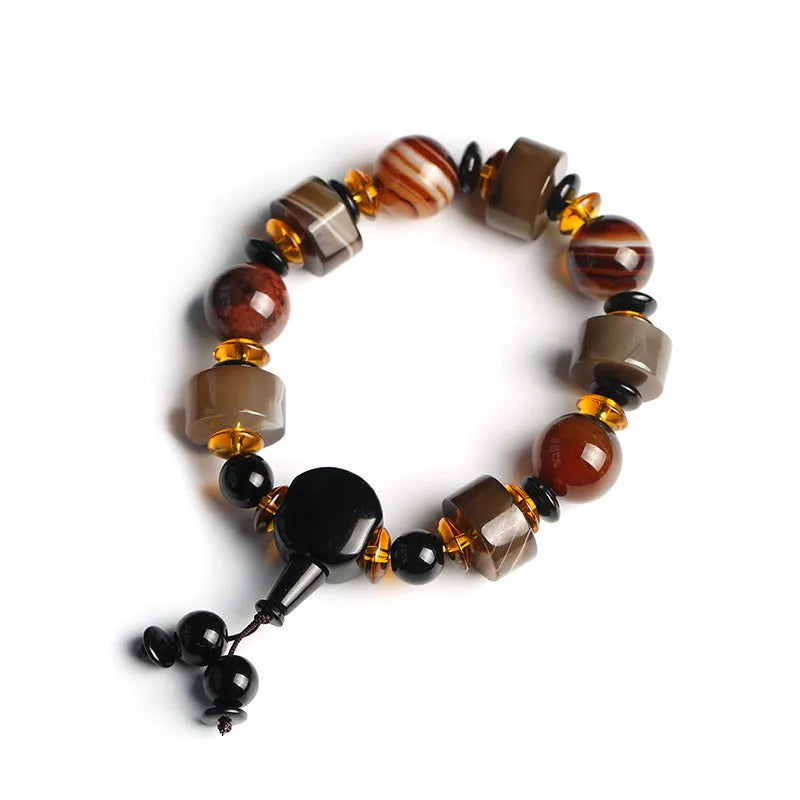 Natural twining line old agate bracelet with sardonyx agate abacus beads and white and red agate spacer beads on neutral background