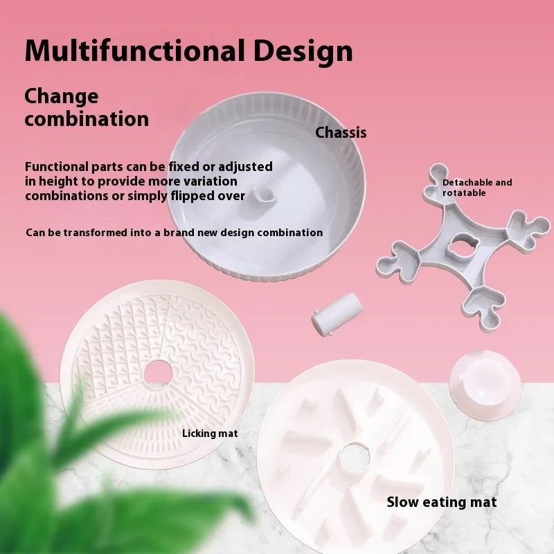 Rotating plastic pet slow feeder bowl with silicone anti-choke mat in windmill pattern.
