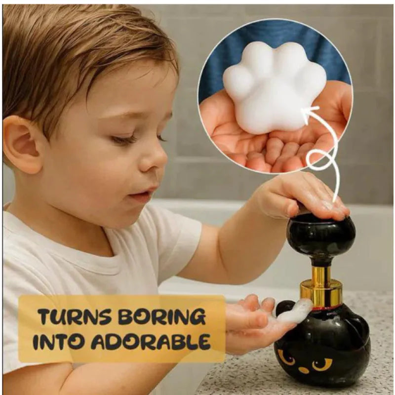 Black cartoon cat-shaped plastic soap dispenser pump bottle on a counter.