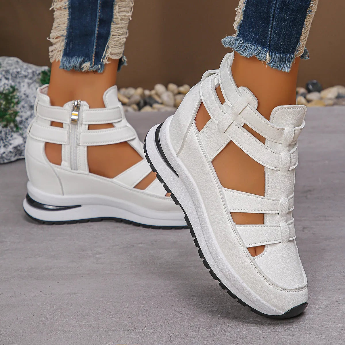 Women's black close-toed platform sandals with hollow-out design and Velcro strap.