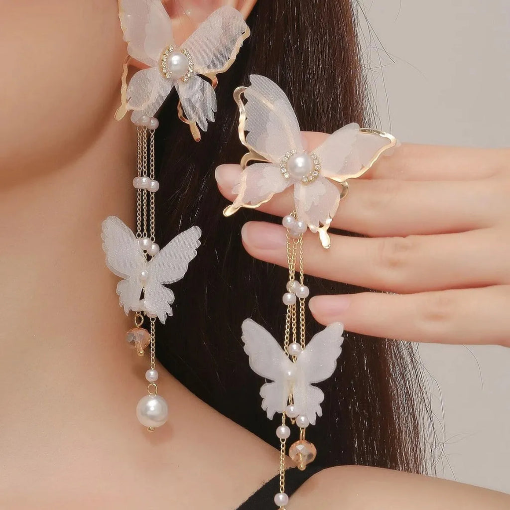 White butterfly tassel earrings with lace pearls and rhinestones on copper alloy