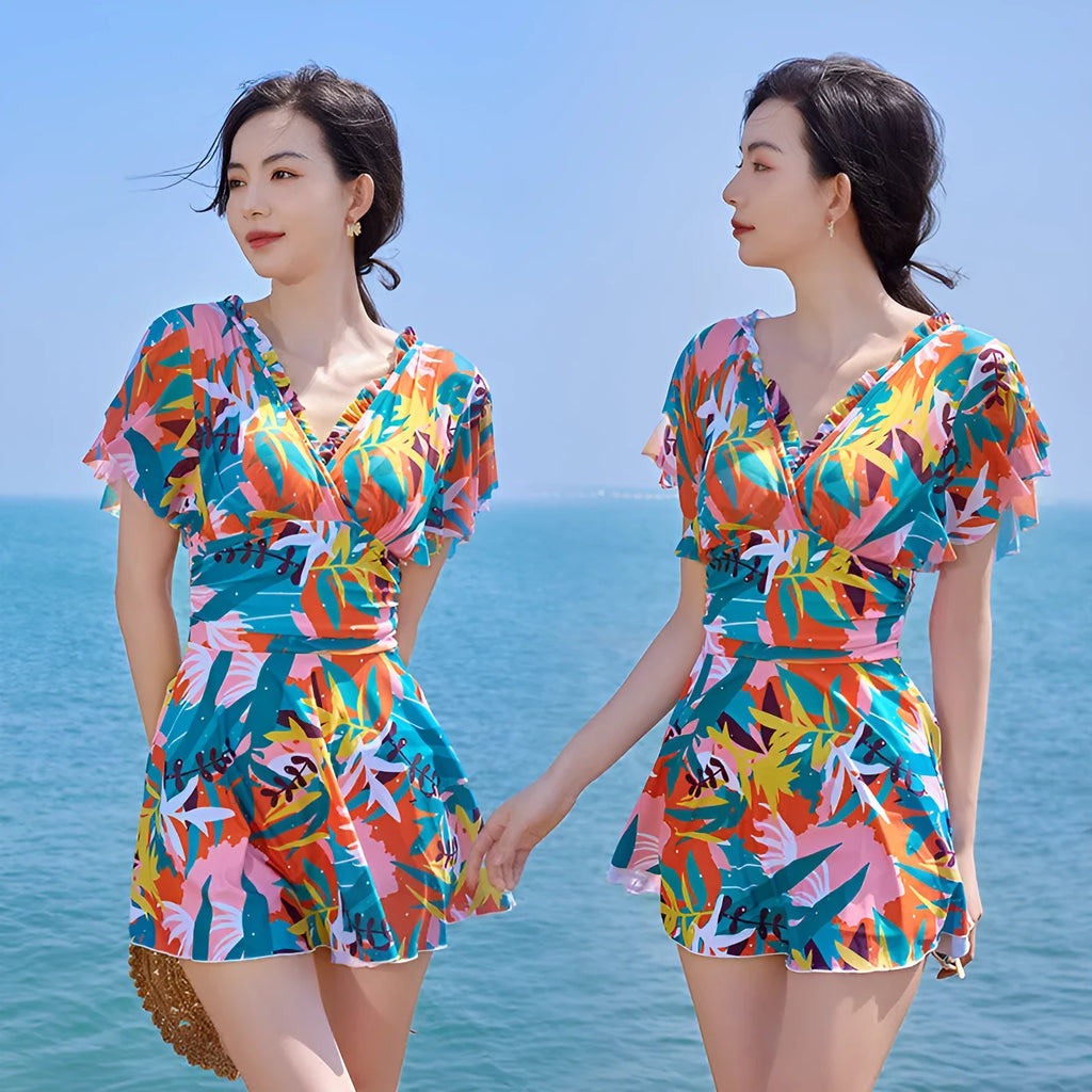 Colourful printed one-piece swimsuit for women available in sizes M to 3XL with belly coverage