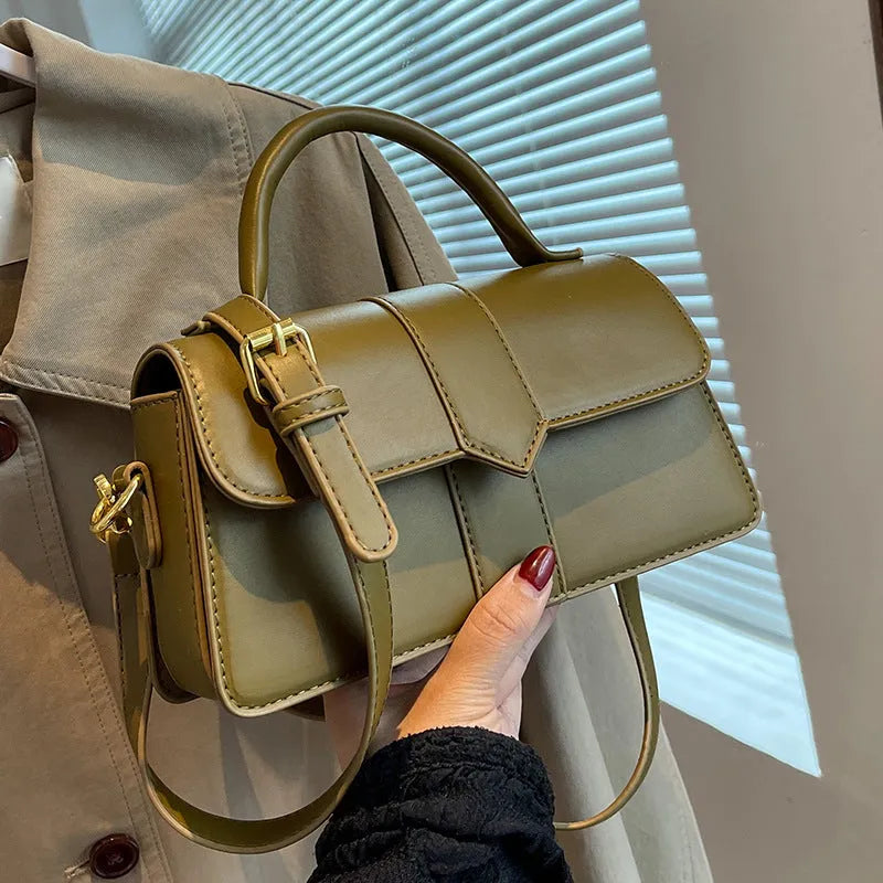Women's beige PU messenger bag showing internal file organisation and sandwich pocket exterior