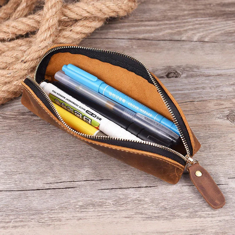Genuine cowhide leather pencil case with zipper closure showing black colour option
