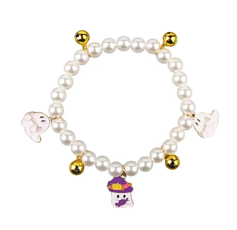 3 imitation pearl pet necklaces with small bells on adjustable cords for Halloween decoration