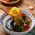 Honeysuckle chrysanthemum herbal tea box with individual sachets and tea cup