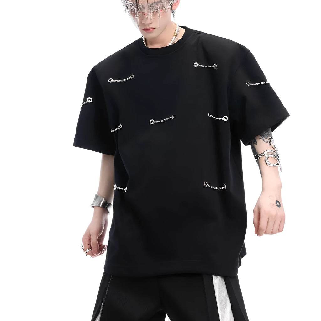 Black short sleeve T-shirt with metal chain detail on padded shoulders, round neck, heavy cotton fabric