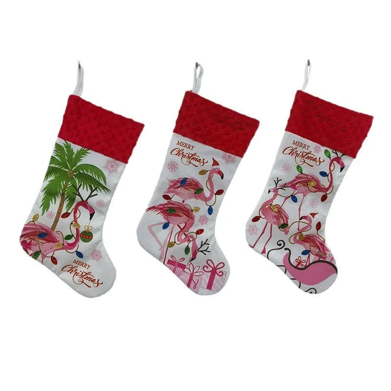 Flamingo patterned cloth Christmas stocking hanging decoration measuring 46 by 28 centimetres