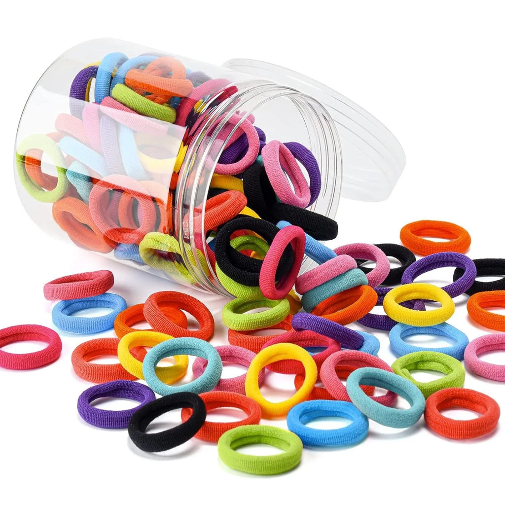 100 seamless cotton baby hair ties in 10 assorted colours stored in a small jar