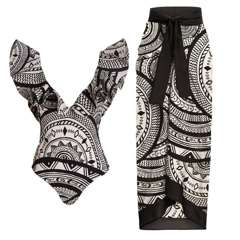 Women's vintage printed one-piece swimsuit with deep V neckline and ruffles, shown with matching wrap skirt.