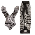 Women's vintage printed one-piece swimsuit with deep V neckline and ruffles, shown with matching wrap skirt.