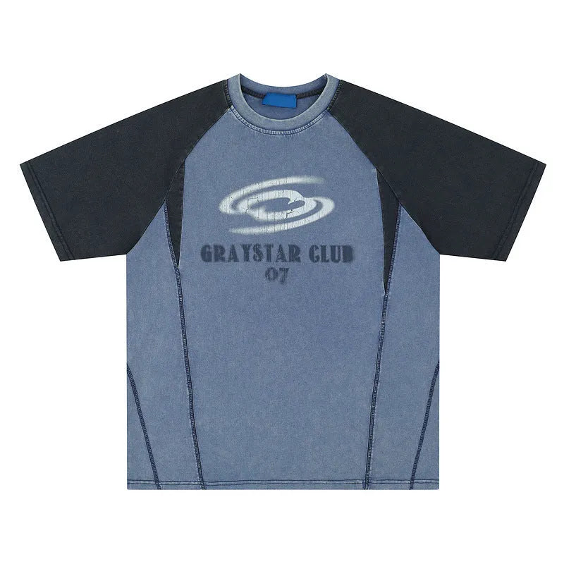 Man wearing a blue hip hop letter print t-shirt with raglan sleeves.