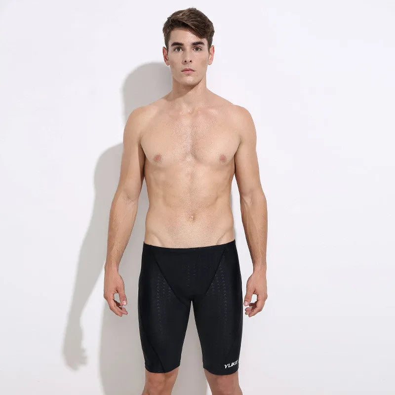 Men's black polyester swimming set with trunks, goggles, cap, accessories, and bag