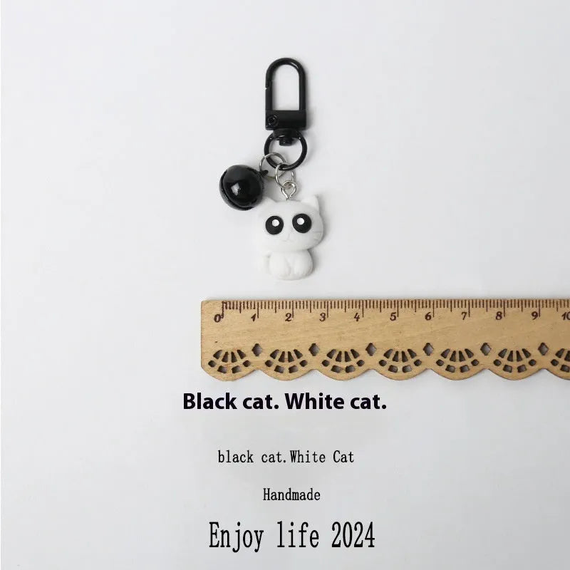 Cartoon little black cat and white kitten key chain pendant on handbag