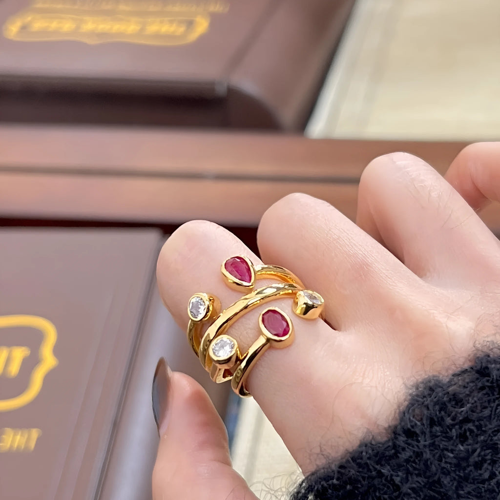 Irregular geometric copper ring with two-tone colour and a cross diamond design.