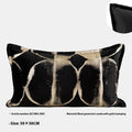 Black gold abstract pattern decorative flannel cushion with removable cover in three sizes.
