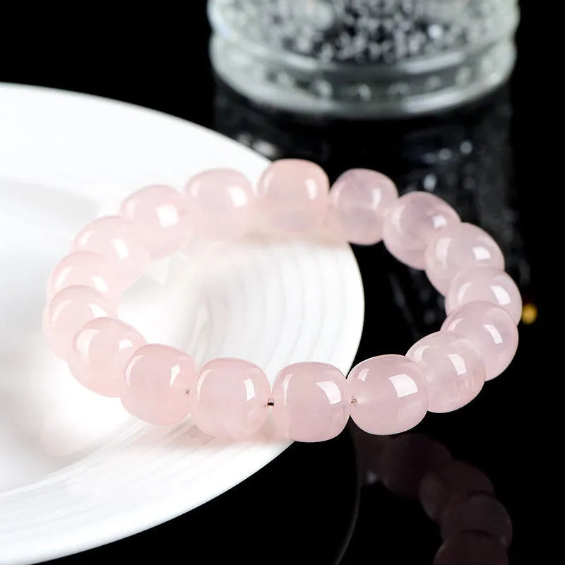 Pink crystal barrel bead bracelet with 11x12mm geometric beads and grinding treatment