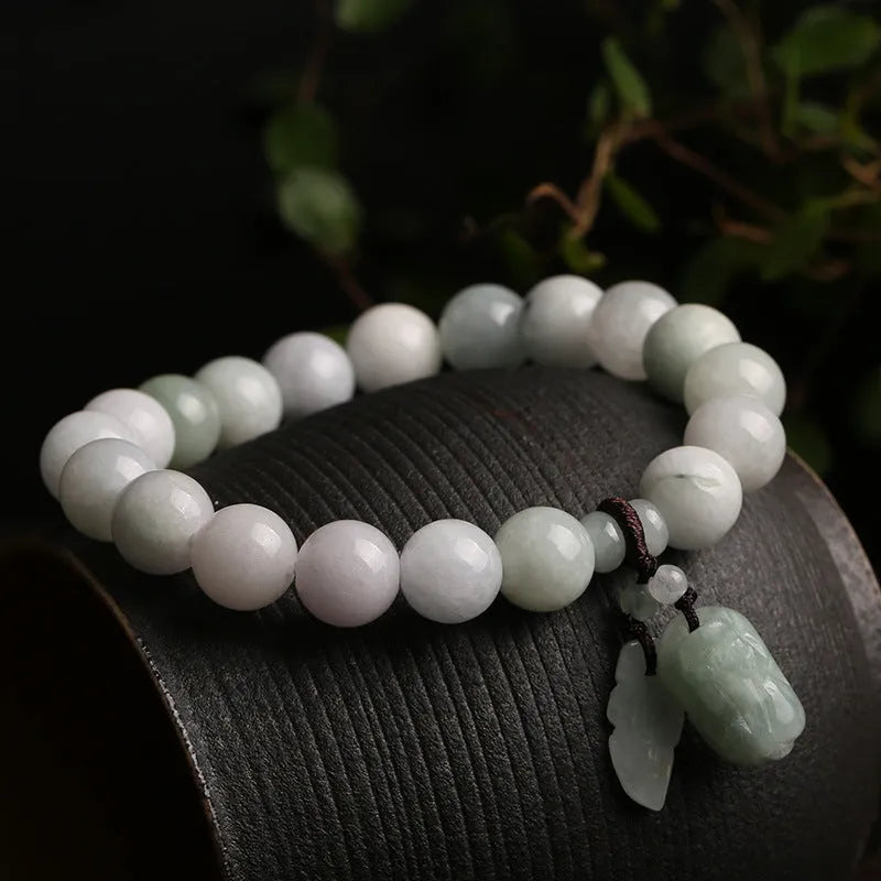 Natural emerald jade bracelet with geometric design and Maitreya Buddha hanging charm