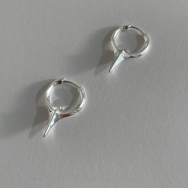 Geometric star design women's ear clips with copper construction and electroplated white gold finish