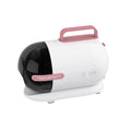 Pink and white pet grooming vacuum cleaner with electric clippers, flat suction head, and grooming tools on a white background