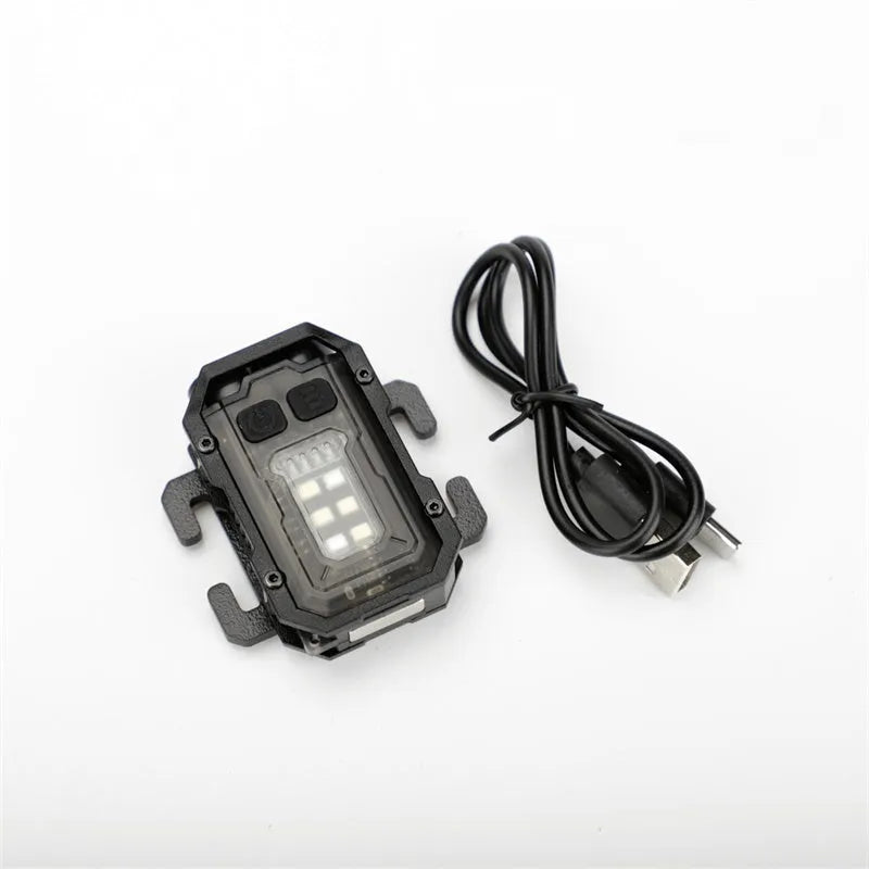 Portable tactical mini warning flashlight with USB charging cable and backpack mount for outdoor use