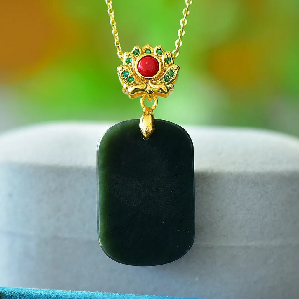 Hetian gray jade flat pendant with copper inlay and ink blue jade detail on necklace