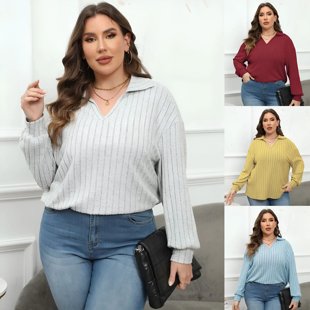 Women's plus size gray polo collar shirt with full lantern sleeves in a street fashion style.