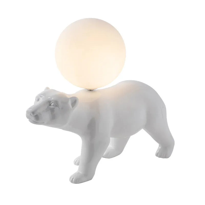 White Nordic style bear table lamp in sitting posture on a bedside table
