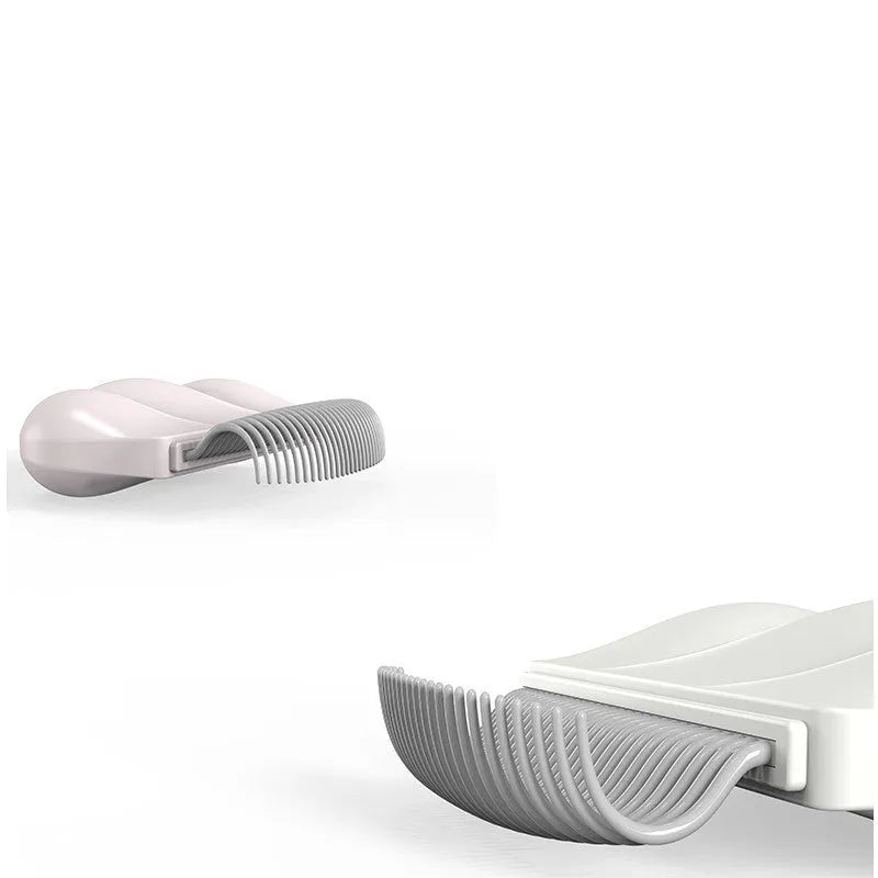 Paw Soft deshedding grooming brush for cats and dogs in blue, pink, or white