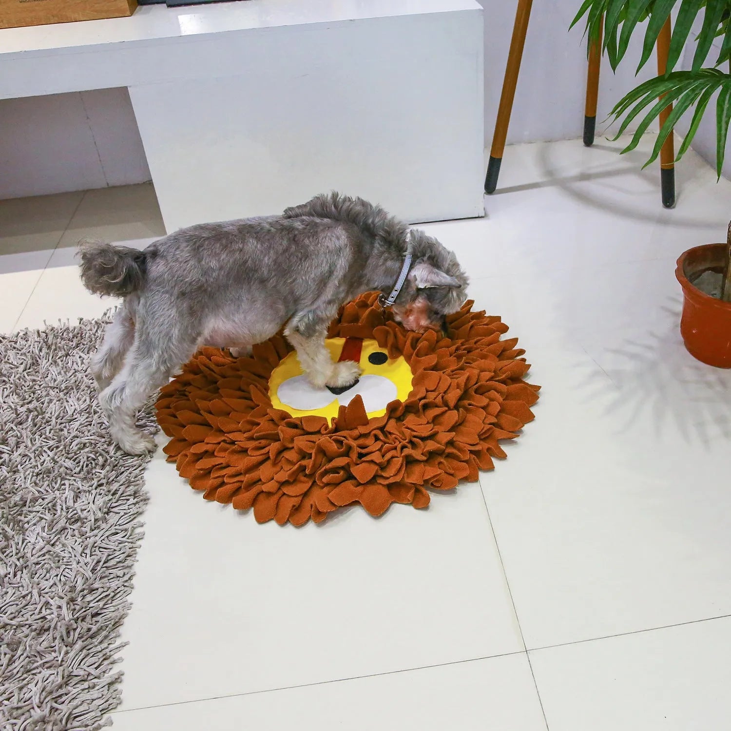 Brown dog snuffle mat with 16 removable fleece strips for hiding treats, measuring 33x25 cm