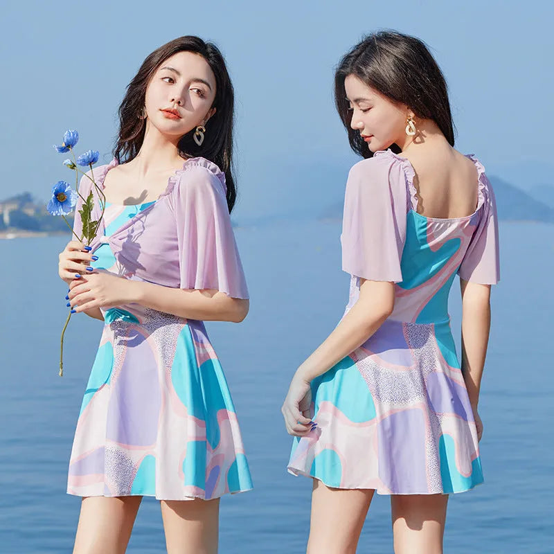 Women's one-piece high-waist floral swimsuit with bowknot detail, light purple floral colour, polyester fabric