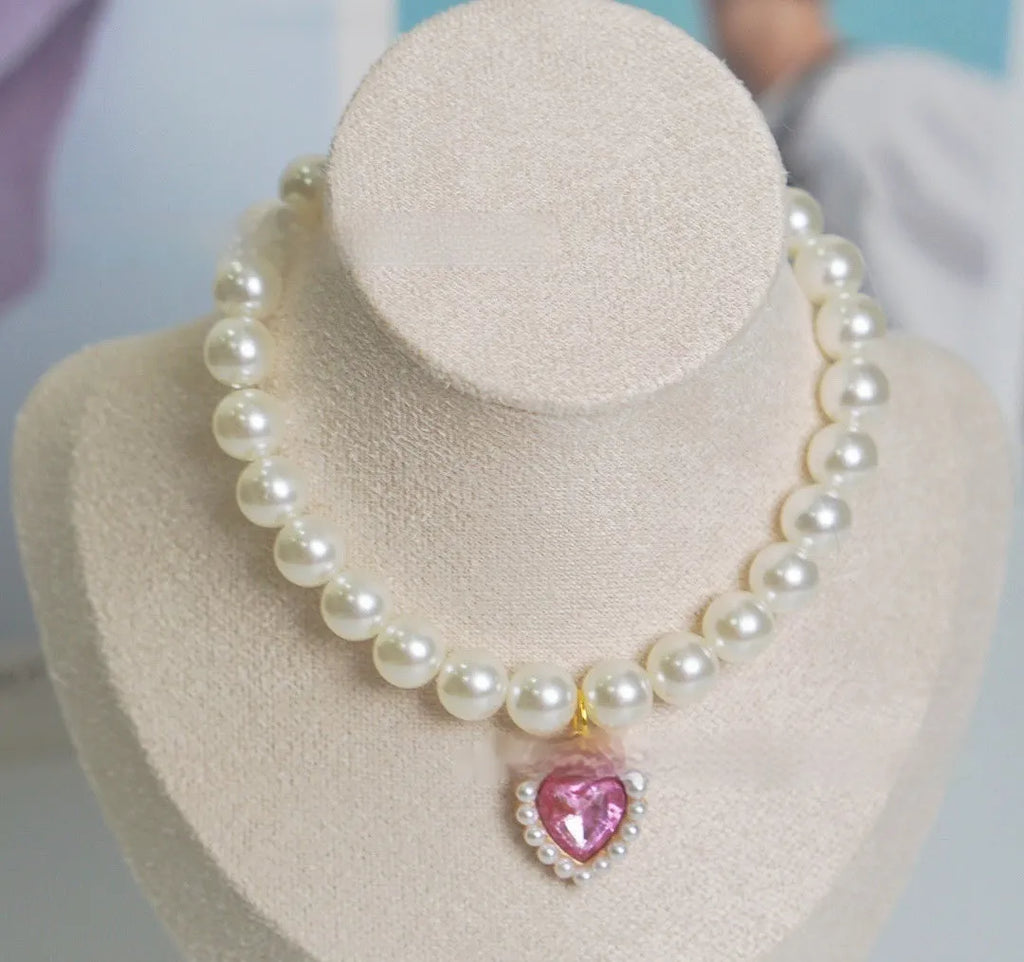 Pearl love gem cat collar in pink on a cat, plastic alloy resin pendant with monochrome design