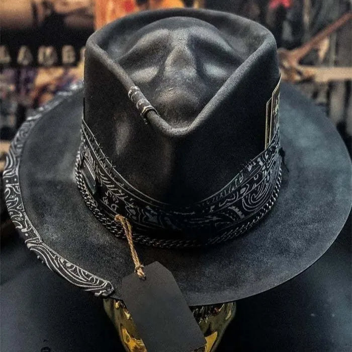 Handmade wool felt skull hat with conical crown showing Halloween design