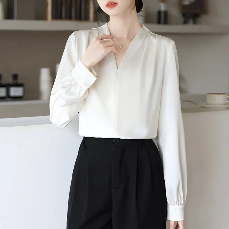 Solid colour women's long sleeve satin shirt with 3D stitching in blue and apricot