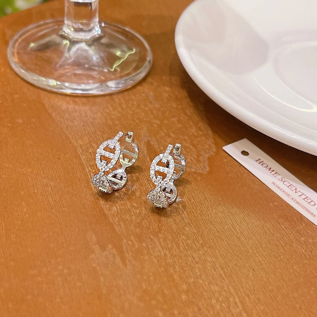 Ladies electroplated copper diamond earrings with thick gold plating in silver colour option