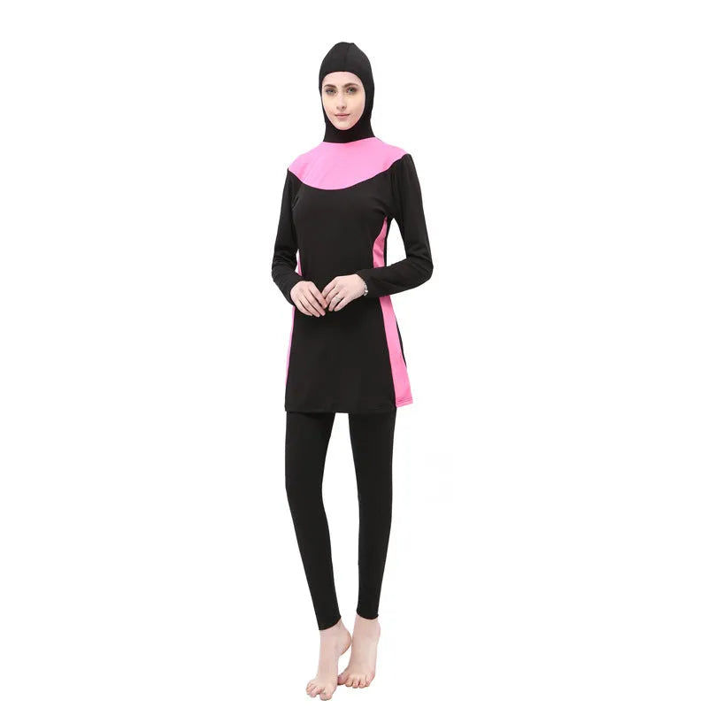 Black women's hooded long sleeve swimsuit with matching pants, shown in conservative one-piece style.