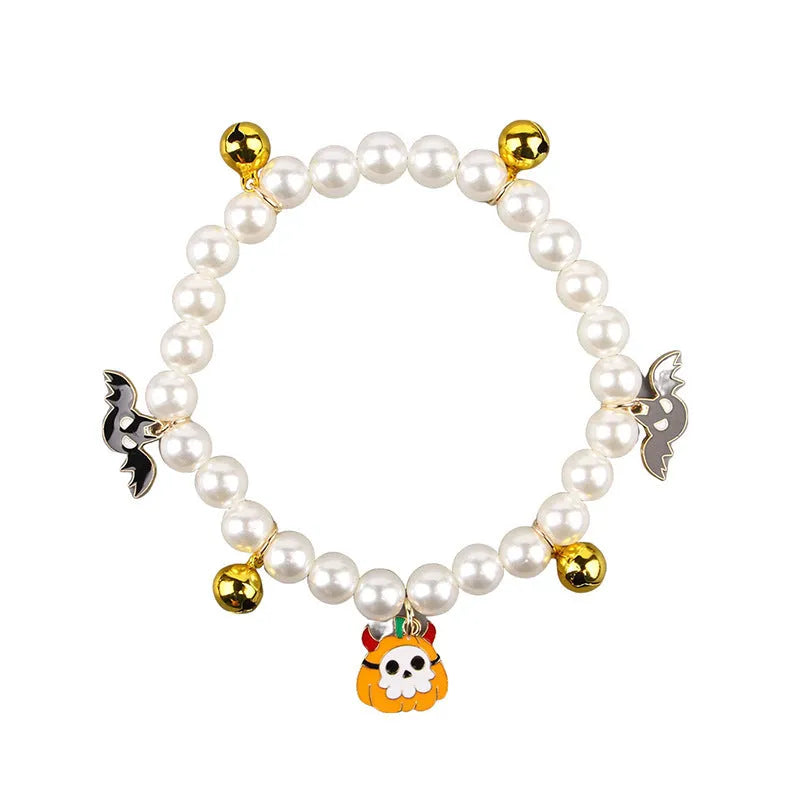 3 imitation pearl pet necklaces with small bells on adjustable cords for Halloween decoration