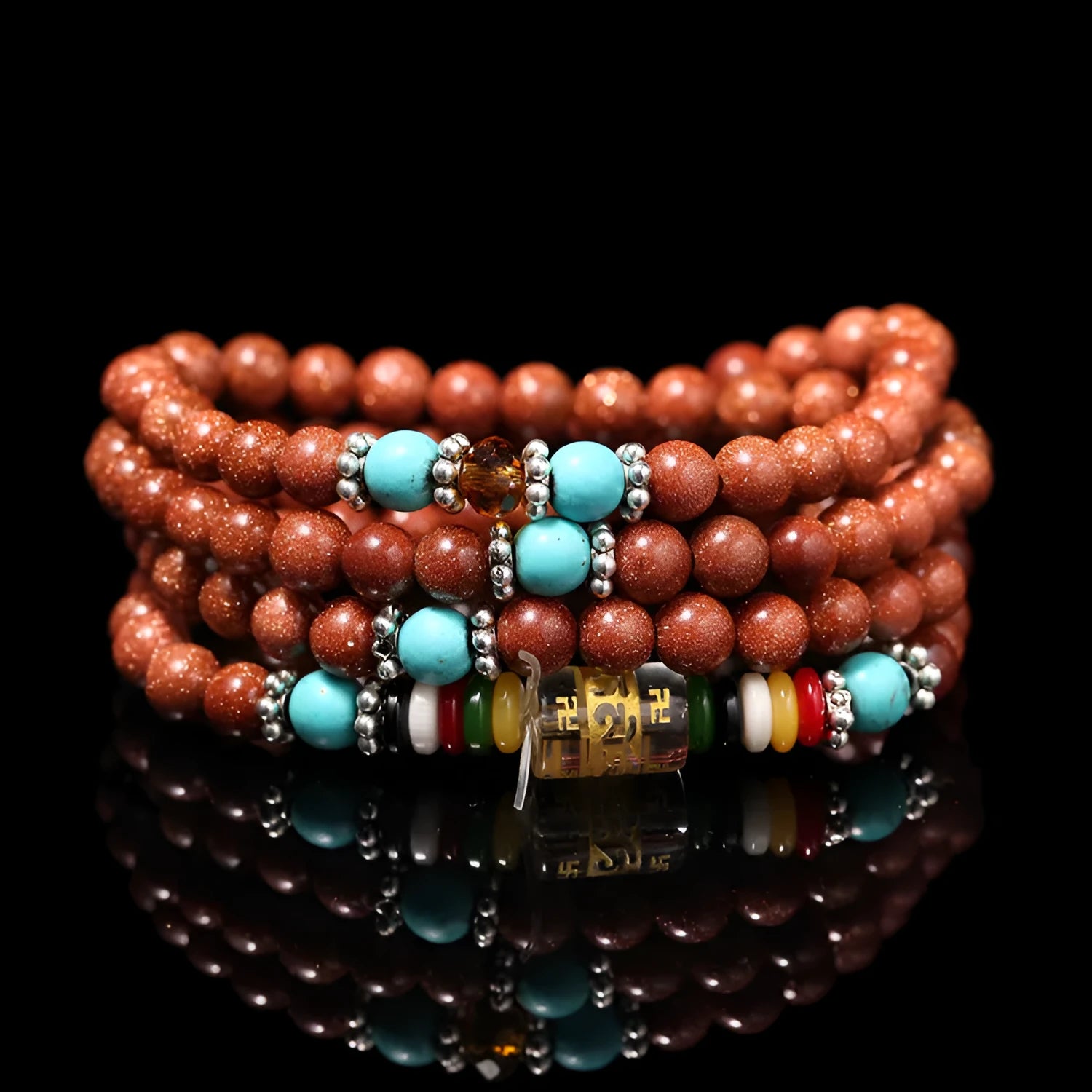 Golden star stone and nugget sand multi-circle bracelet with fu character on a retro-style chain.