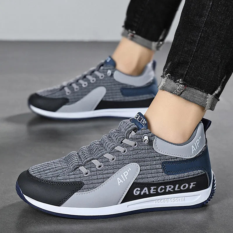 Men's grey mesh running shoes with lace-up design and round toe