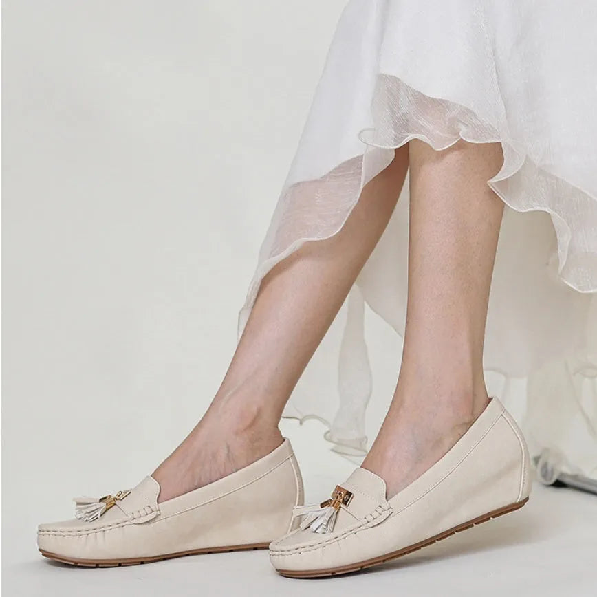 Mid-heel height increasing slip-on shoes in nude, black, blue and brown colours with round toe shape