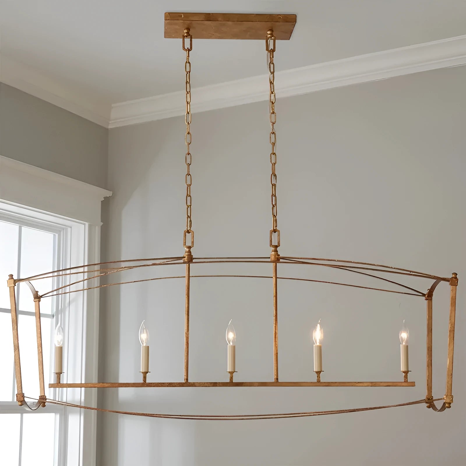 4-head iron droplight ceiling lamp in gold foil finish on a white ceiling with simple villa stair setting