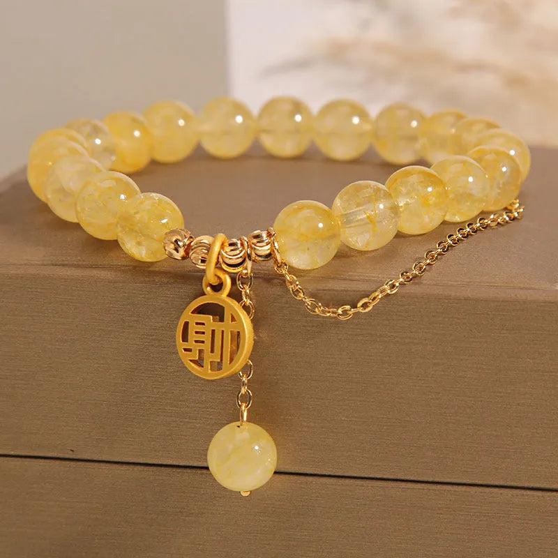 Natural stone citrine bracelet with electroplated metal and Chinese character charm on tassel for women