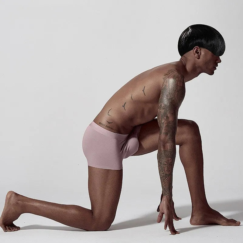 Men's seamless modal briefs in solid colour with mid waist design for body shaping