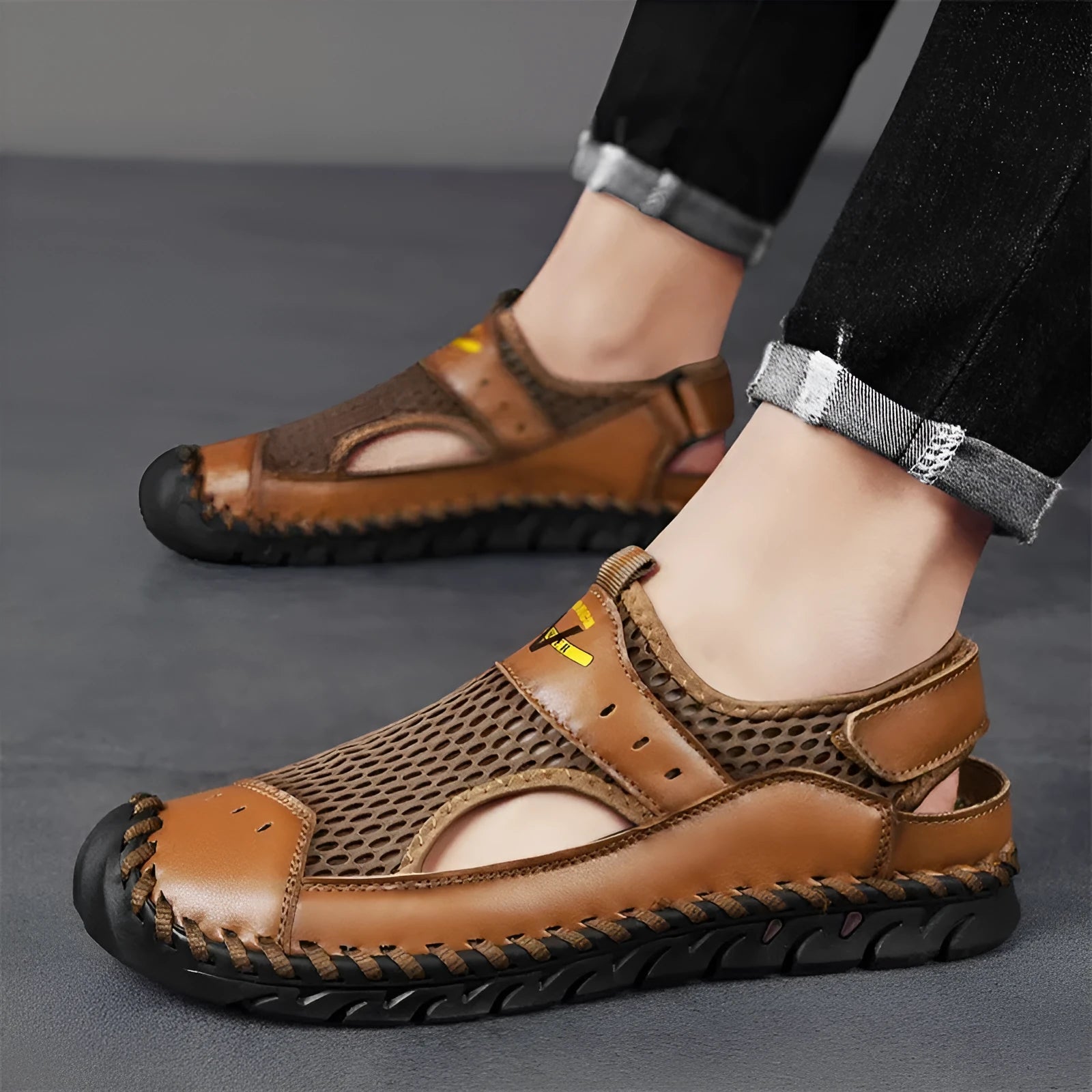 Men's mesh breathable hollow shoes in black genuine leather with rubber sole, low-top design