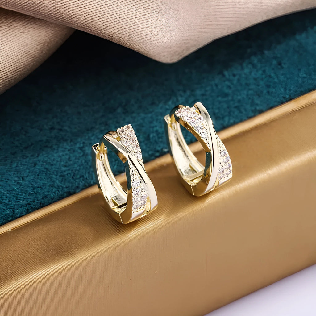 Geometric women's earrings with 14K yellow gold finish and zircon stone details on copper base