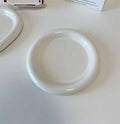 White porcelain plate with bear doodle design in round shape showing 15cm and 20cm size options