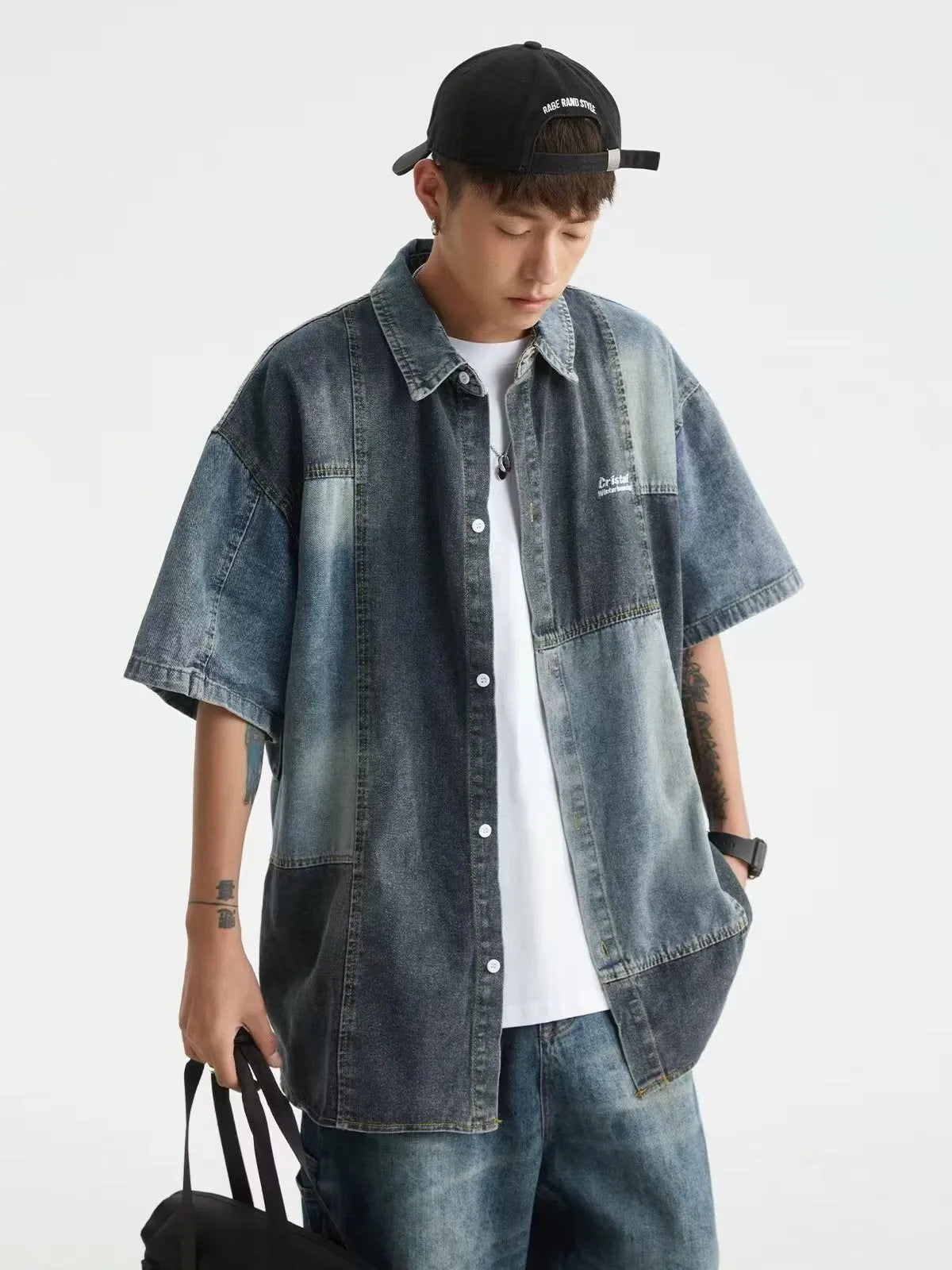 Blue Japanese-inspired men's denim shirt with washed stitching and loose cardigan fit
